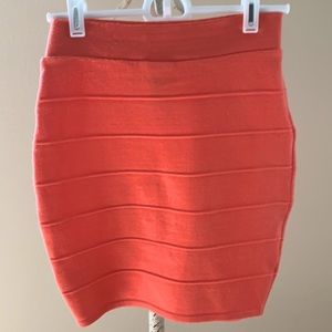 Coral, bandage-like dress